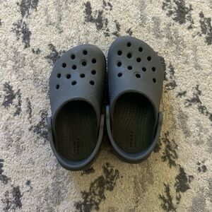 Kids size 8 crocs in gray